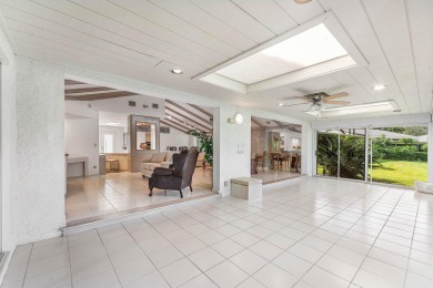 Photos feature remodel concept renderings.Set on a quiet on  in Florida - for sale on GolfHomes.com, golf home, golf lot