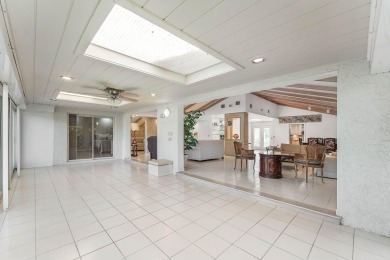 Photos feature remodel concept renderings.Set on a quiet on  in Florida - for sale on GolfHomes.com, golf home, golf lot