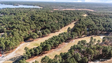 Move right in and relax in this quaint, adorable two bedroom on Beacon Ridge Golf and Country Club in North Carolina - for sale on GolfHomes.com, golf home, golf lot