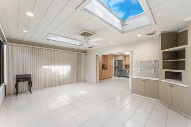 Photos feature remodel concept renderings.Set on a quiet on  in Florida - for sale on GolfHomes.com, golf home, golf lot