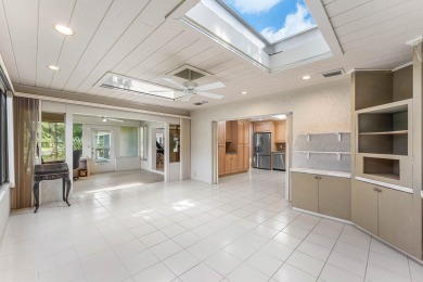 Photos feature remodel concept renderings.Set on a quiet on  in Florida - for sale on GolfHomes.com, golf home, golf lot