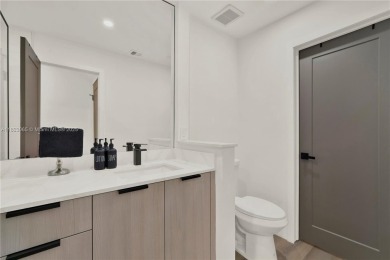 Stunning fully renovated 3-bed, 2-bath townhouse in The on Jim McLean Signature Course in Florida - for sale on GolfHomes.com, golf home, golf lot