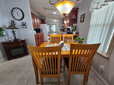 This home is on leased land, buyers do not own the land. This on Big Cypress Golf and Country Club in Florida - for sale on GolfHomes.com, golf home, golf lot