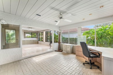 Photos feature remodel concept renderings.Set on a quiet on  in Florida - for sale on GolfHomes.com, golf home, golf lot