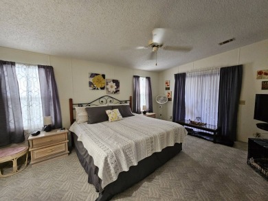 This home is on leased land, buyers do not own the land. This on Big Cypress Golf and Country Club in Florida - for sale on GolfHomes.com, golf home, golf lot
