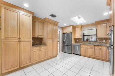 Photos feature remodel concept renderings.Set on a quiet on  in Florida - for sale on GolfHomes.com, golf home, golf lot