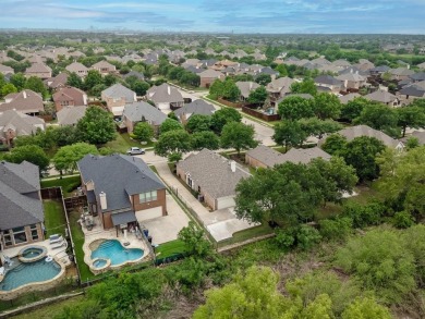 Nestled along the 4th fairway of The Trails Golf Course, this on The Trails of Frisco Golf Club in Texas - for sale on GolfHomes.com, golf home, golf lot