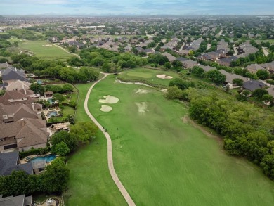 Nestled along the 4th fairway of The Trails Golf Course, this on The Trails of Frisco Golf Club in Texas - for sale on GolfHomes.com, golf home, golf lot
