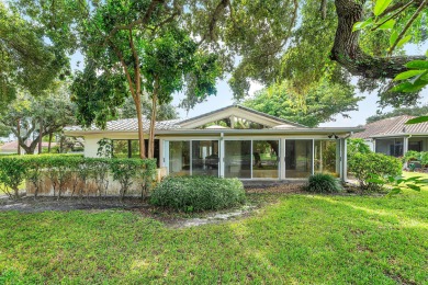 Photos feature remodel concept renderings.Set on a quiet on  in Florida - for sale on GolfHomes.com, golf home, golf lot