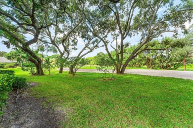 Photos feature remodel concept renderings.Set on a quiet on  in Florida - for sale on GolfHomes.com, golf home, golf lot