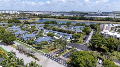 Stunning fully renovated 3-bed, 2-bath townhouse in The on Jim McLean Signature Course in Florida - for sale on GolfHomes.com, golf home, golf lot