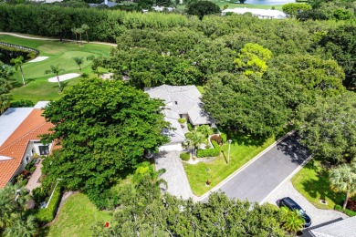 Photos feature remodel concept renderings.Set on a quiet on  in Florida - for sale on GolfHomes.com, golf home, golf lot