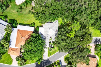 Photos feature remodel concept renderings.Set on a quiet on  in Florida - for sale on GolfHomes.com, golf home, golf lot