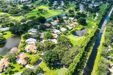 Photos feature remodel concept renderings.Set on a quiet on  in Florida - for sale on GolfHomes.com, golf home, golf lot