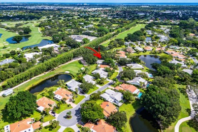Photos feature remodel concept renderings.Set on a quiet on  in Florida - for sale on GolfHomes.com, golf home, golf lot
