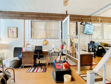 CHARMING, UNIQUE, MOBILE HOME IN FABULOUS HOLIDAY PARK, A on Sabal Trace Golf and Country Club in Florida - for sale on GolfHomes.com, golf home, golf lot