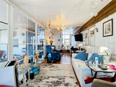 CHARMING, UNIQUE, MOBILE HOME IN FABULOUS HOLIDAY PARK, A on Sabal Trace Golf and Country Club in Florida - for sale on GolfHomes.com, golf home, golf lot