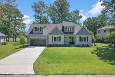 This brand new Riptide home with stunning setting and finishes on Sea Trail Golf Resort in North Carolina - for sale on GolfHomes.com, golf home, golf lot