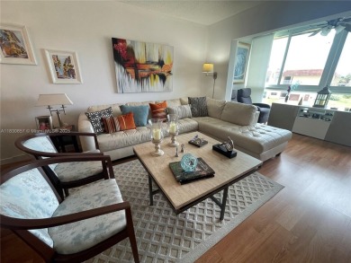 Enjoy serene lake views and resort-style living in this on Sunrise Lakes Phase III in Florida - for sale on GolfHomes.com, golf home, golf lot