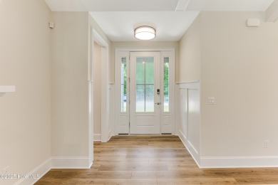 This brand new Riptide home with stunning setting and finishes on Sea Trail Golf Resort in North Carolina - for sale on GolfHomes.com, golf home, golf lot
