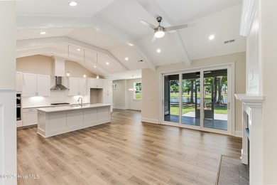 This brand new Riptide home with stunning setting and finishes on Sea Trail Golf Resort in North Carolina - for sale on GolfHomes.com, golf home, golf lot