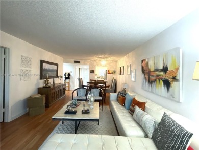 Enjoy serene lake views and resort-style living in this on Sunrise Lakes Phase III in Florida - for sale on GolfHomes.com, golf home, golf lot