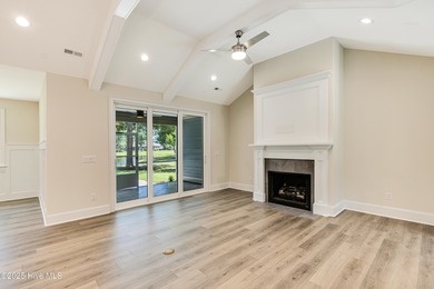 This brand new Riptide home with stunning setting and finishes on Sea Trail Golf Resort in North Carolina - for sale on GolfHomes.com, golf home, golf lot