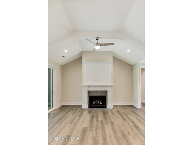 This brand new Riptide home with stunning setting and finishes on Sea Trail Golf Resort in North Carolina - for sale on GolfHomes.com, golf home, golf lot