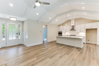 This brand new Riptide home with stunning setting and finishes on Sea Trail Golf Resort in North Carolina - for sale on GolfHomes.com, golf home, golf lot