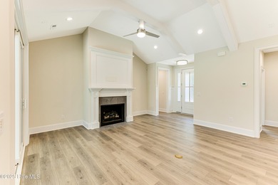 This brand new Riptide home with stunning setting and finishes on Sea Trail Golf Resort in North Carolina - for sale on GolfHomes.com, golf home, golf lot