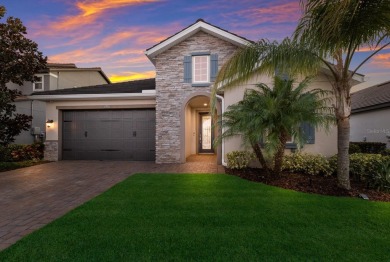 Under contract-accepting backup offers. CUSTOM WATERFRONT POOL on Esplanade Golf and Country at Lakewood Ranch in Florida - for sale on GolfHomes.com, golf home, golf lot