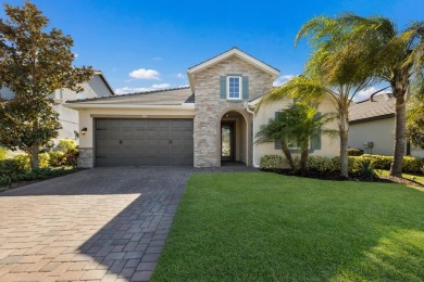 Under contract-accepting backup offers. CUSTOM WATERFRONT POOL on Esplanade Golf and Country at Lakewood Ranch in Florida - for sale on GolfHomes.com, golf home, golf lot