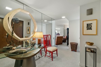 This 3-bed, 3-bath 3rd-floor condo at Desert Island combines on Desert Island Golf and Country Club in California - for sale on GolfHomes.com, golf home, golf lot