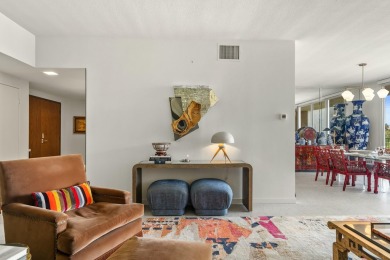 This 3-bed, 3-bath 3rd-floor condo at Desert Island combines on Desert Island Golf and Country Club in California - for sale on GolfHomes.com, golf home, golf lot