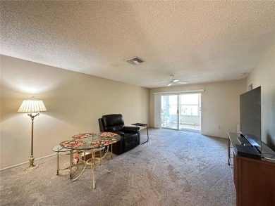 Enjoy maintenance-free living in this well-maintained 2-bedroom on Beacon Woods Golf Club in Florida - for sale on GolfHomes.com, golf home, golf lot