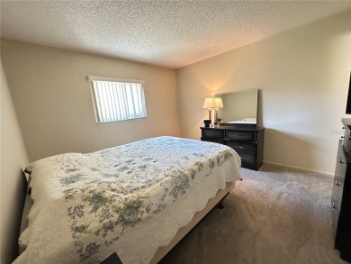 Enjoy maintenance-free living in this well-maintained 2-bedroom on Beacon Woods Golf Club in Florida - for sale on GolfHomes.com, golf home, golf lot