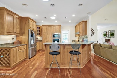 This exceptional custom-built home showcases timeless Low on Lockwood Folly Country Club in North Carolina - for sale on GolfHomes.com, golf home, golf lot