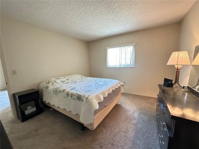 Enjoy maintenance-free living in this well-maintained 2-bedroom on Beacon Woods Golf Club in Florida - for sale on GolfHomes.com, golf home, golf lot