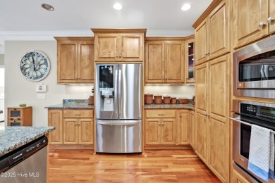 This exceptional custom-built home showcases timeless Low on Lockwood Folly Country Club in North Carolina - for sale on GolfHomes.com, golf home, golf lot