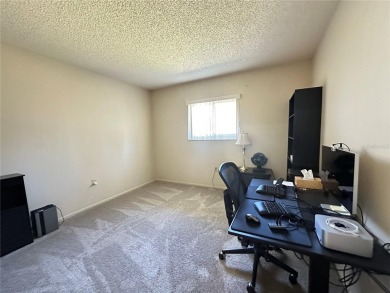 Enjoy maintenance-free living in this well-maintained 2-bedroom on Beacon Woods Golf Club in Florida - for sale on GolfHomes.com, golf home, golf lot