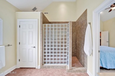 This exceptional custom-built home showcases timeless Low on Lockwood Folly Country Club in North Carolina - for sale on GolfHomes.com, golf home, golf lot