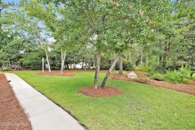 This exceptional custom-built home showcases timeless Low on Lockwood Folly Country Club in North Carolina - for sale on GolfHomes.com, golf home, golf lot