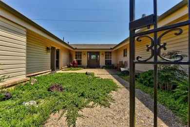 Welcome to this charming 1960s ranch-style home on Lake Hefner on Lake Hefner Golf Club in Oklahoma - for sale on GolfHomes.com, golf home, golf lot