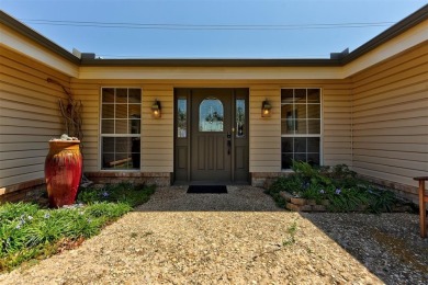 Welcome to this charming 1960s ranch-style home on Lake Hefner on Lake Hefner Golf Club in Oklahoma - for sale on GolfHomes.com, golf home, golf lot