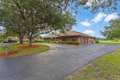 Incredible opportunity to own a spacious 4-bedroom plus on Country Club of Coral Springs in Florida - for sale on GolfHomes.com, golf home, golf lot