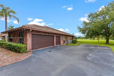 Incredible opportunity to own a spacious 4-bedroom plus on Country Club of Coral Springs in Florida - for sale on GolfHomes.com, golf home, golf lot