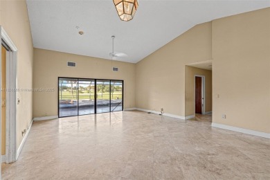 Incredible opportunity to own a spacious 4-bedroom plus on Country Club of Coral Springs in Florida - for sale on GolfHomes.com, golf home, golf lot