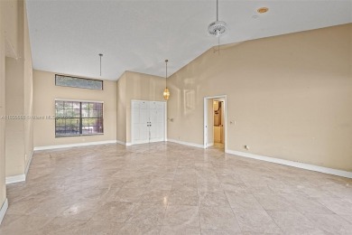 Incredible opportunity to own a spacious 4-bedroom plus on Country Club of Coral Springs in Florida - for sale on GolfHomes.com, golf home, golf lot