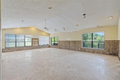 Incredible opportunity to own a spacious 4-bedroom plus on Country Club of Coral Springs in Florida - for sale on GolfHomes.com, golf home, golf lot