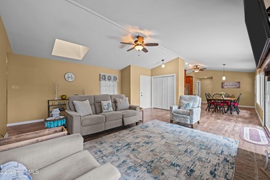 Welcome to your dream escape on the water! Nestled on wooded 2 on River Bend Golf and Country Club in North Carolina - for sale on GolfHomes.com, golf home, golf lot